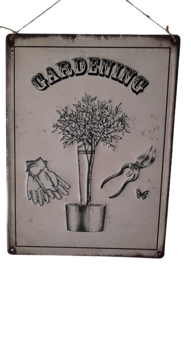 La Hacienda Gardening Embossed Metal Sign